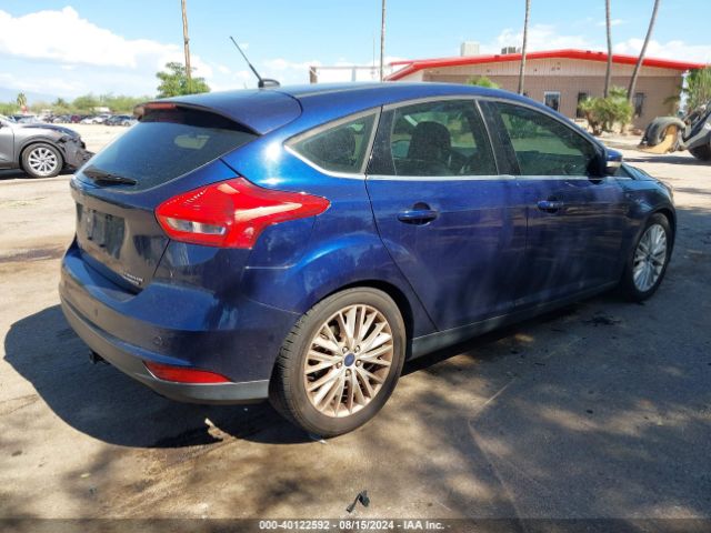 Photo 3 VIN: 1FADP3N22GL227083 - FORD FOCUS 