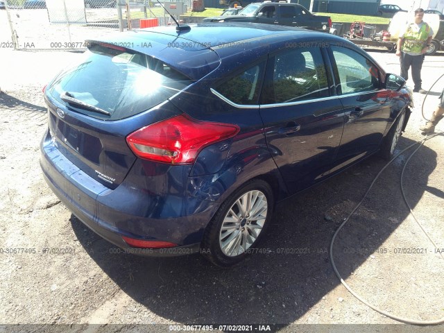 Photo 3 VIN: 1FADP3N22GL243932 - FORD FOCUS 