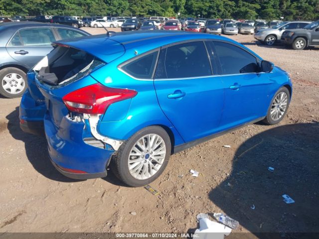 Photo 3 VIN: 1FADP3N22GL257538 - FORD FOCUS 