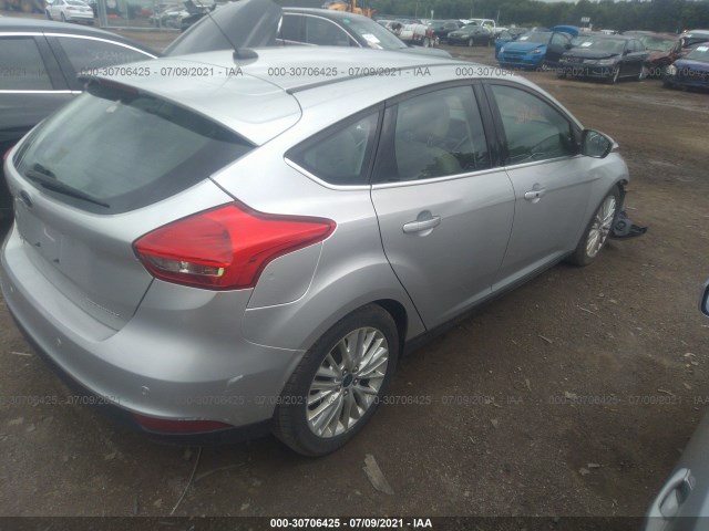 Photo 3 VIN: 1FADP3N22GL264909 - FORD FOCUS 