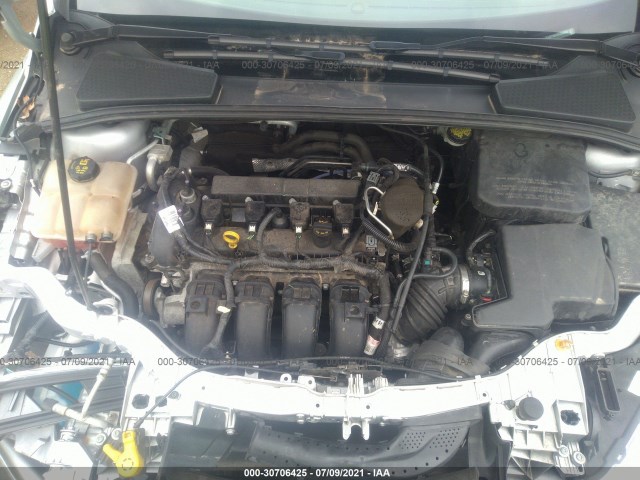 Photo 9 VIN: 1FADP3N22GL264909 - FORD FOCUS 