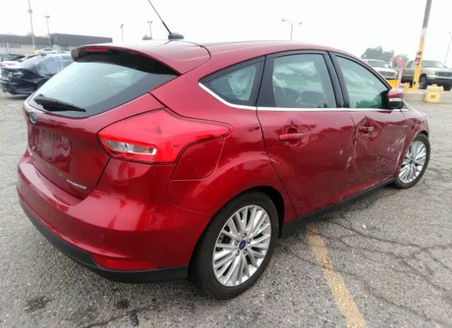 Photo 3 VIN: 1FADP3N22GL337079 - FORD FOCUS 