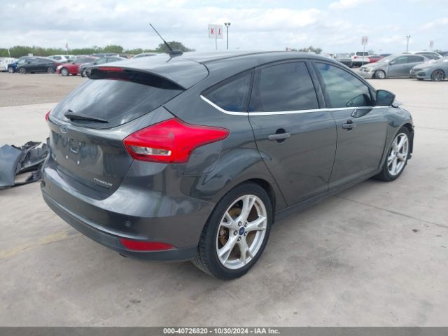 Photo 3 VIN: 1FADP3N22GL388548 - FORD FOCUS 