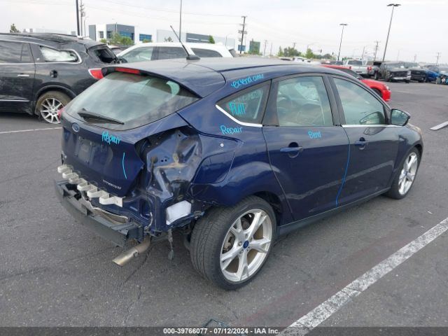 Photo 3 VIN: 1FADP3N22GL407423 - FORD FOCUS 