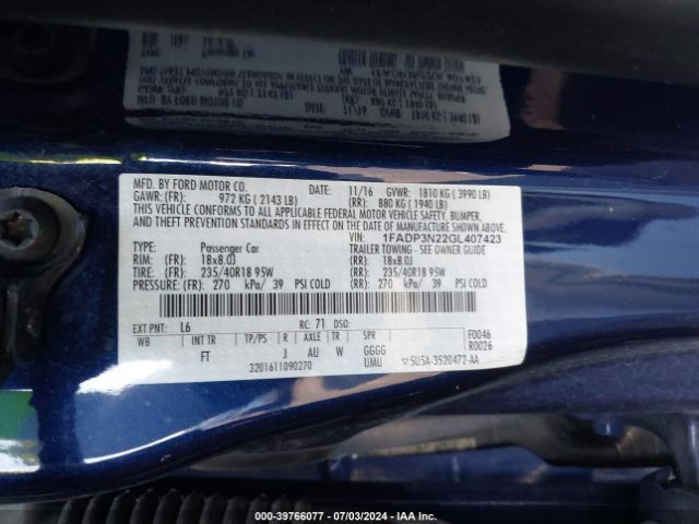 Photo 8 VIN: 1FADP3N22GL407423 - FORD FOCUS 