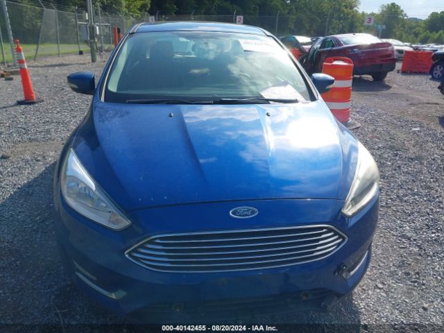 Photo 5 VIN: 1FADP3N22JL308978 - FORD FOCUS 