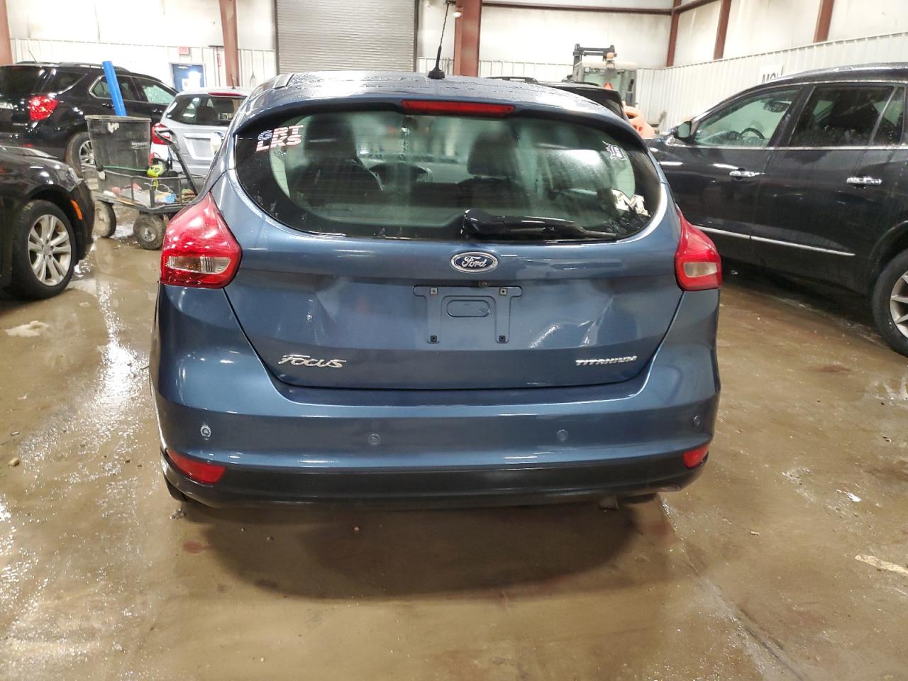 Photo 5 VIN: 1FADP3N22JL326008 - FORD FOCUS 