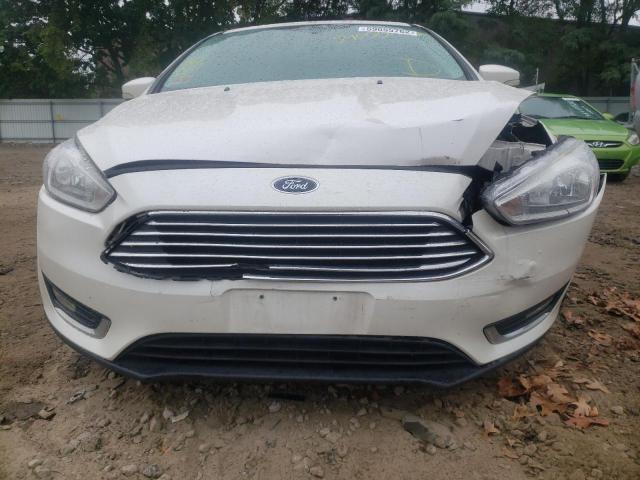 Photo 8 VIN: 1FADP3N23GL223575 - FORD FOCUS TITA 