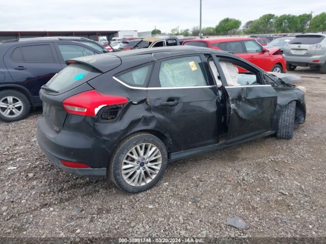 Photo 1 VIN: 1FADP3N23GL302437 - FORD FOCUS 