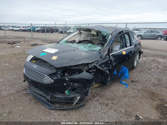 Photo 3 VIN: 1FADP3N23GL302437 - FORD FOCUS 