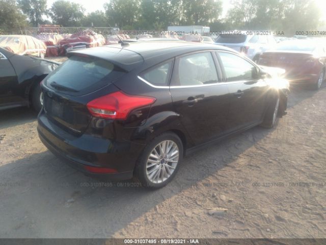 Photo 3 VIN: 1FADP3N23GL307878 - FORD FOCUS 