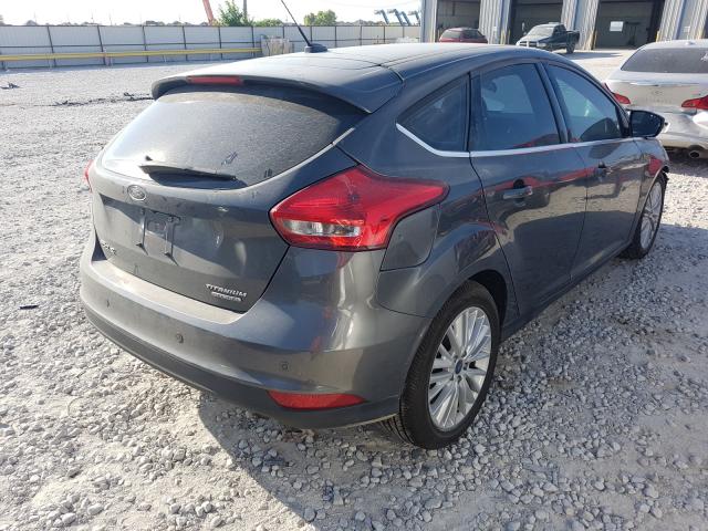 Photo 3 VIN: 1FADP3N23GL356742 - FORD FOCUS 