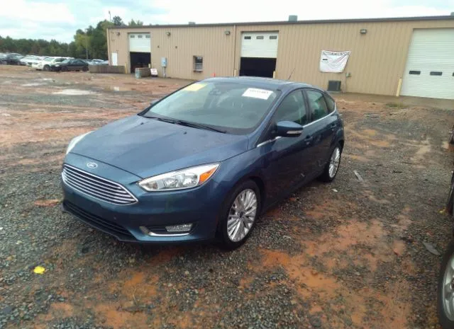 Photo 1 VIN: 1FADP3N23JL226614 - FORD FOCUS 