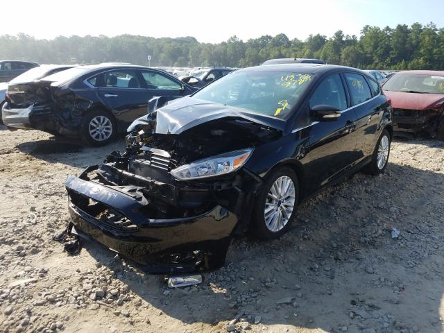 Photo 1 VIN: 1FADP3N23JL272041 - FORD FOCUS 