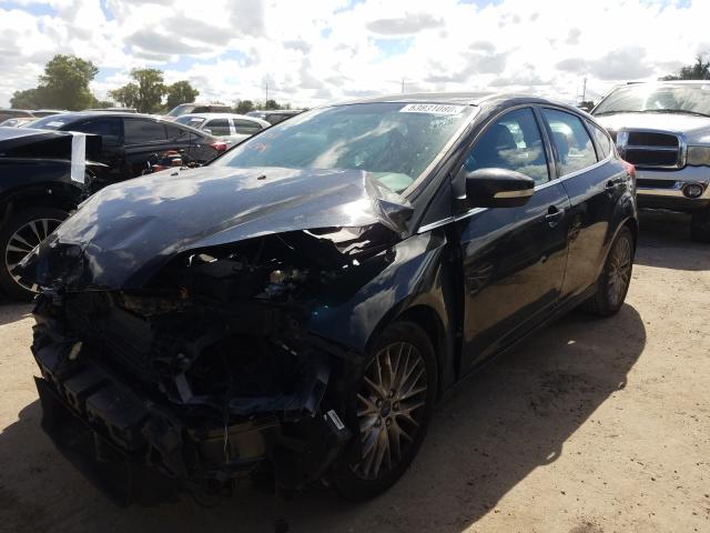 Photo 1 VIN: 1FADP3N24EL257554 - FORD FOCUS TITA 