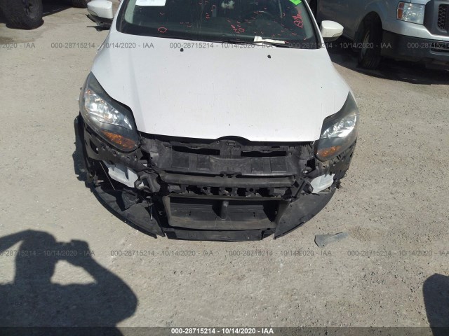 Photo 5 VIN: 1FADP3N24EL294720 - FORD FOCUS 