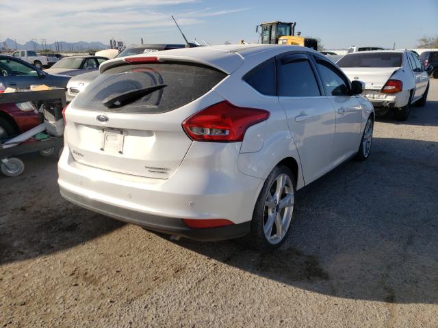 Photo 3 VIN: 1FADP3N24GL297586 - FORD FOCUS 