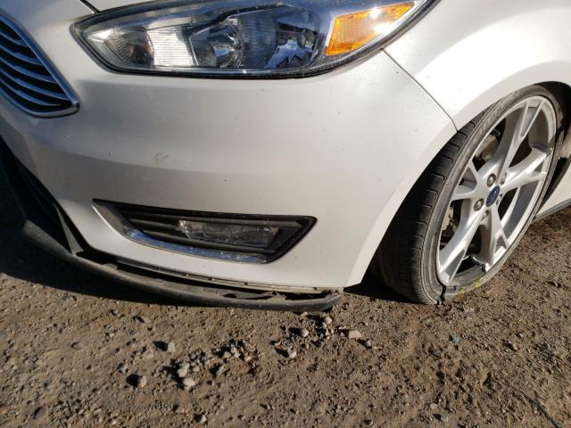 Photo 8 VIN: 1FADP3N24GL297586 - FORD FOCUS 