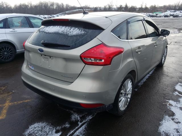 Photo 3 VIN: 1FADP3N24GL299600 - FORD FOCUS 