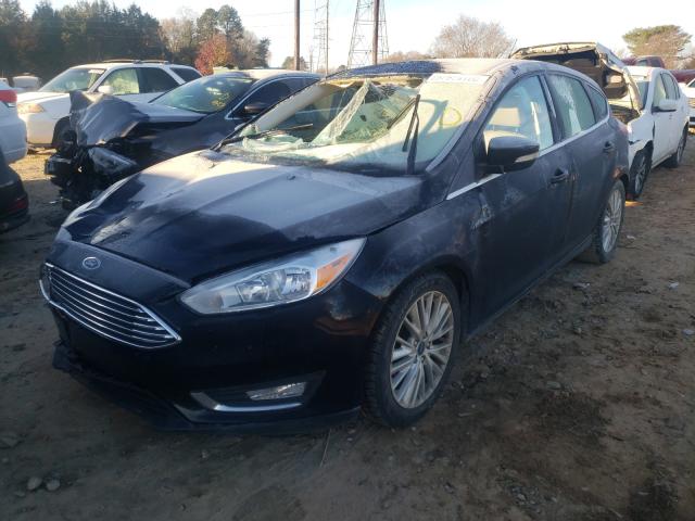 Photo 1 VIN: 1FADP3N24GL307890 - FORD FOCUS 