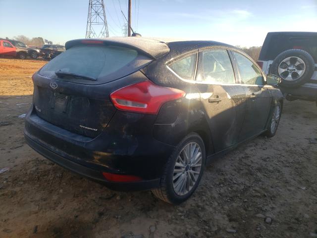 Photo 3 VIN: 1FADP3N24GL307890 - FORD FOCUS 