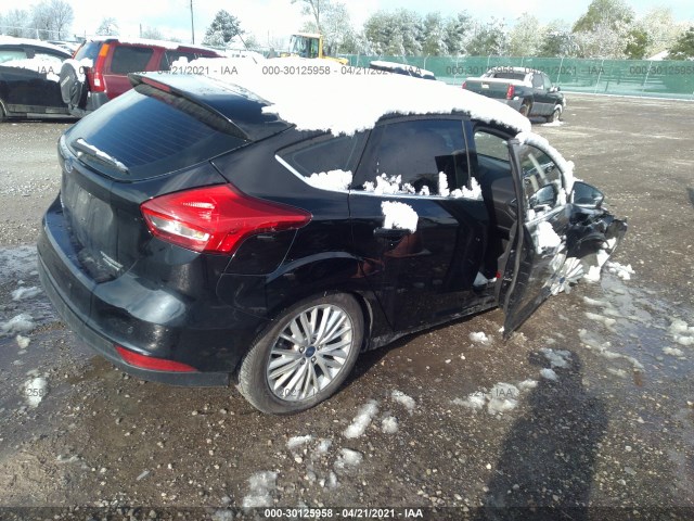 Photo 3 VIN: 1FADP3N24GL368639 - FORD FOCUS 