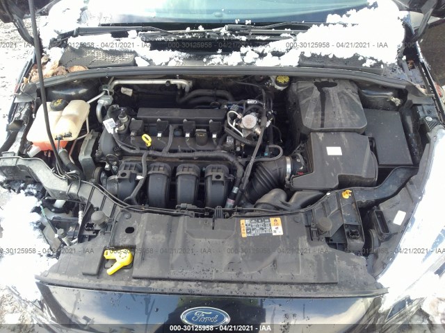 Photo 9 VIN: 1FADP3N24GL368639 - FORD FOCUS 