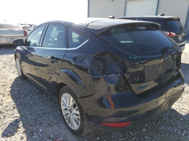 Photo 2 VIN: 1FADP3N24GL407326 - FORD FOCUS 