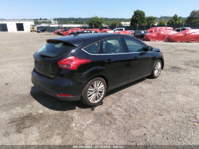 Photo 3 VIN: 1FADP3N24JL219719 - FORD FOCUS 