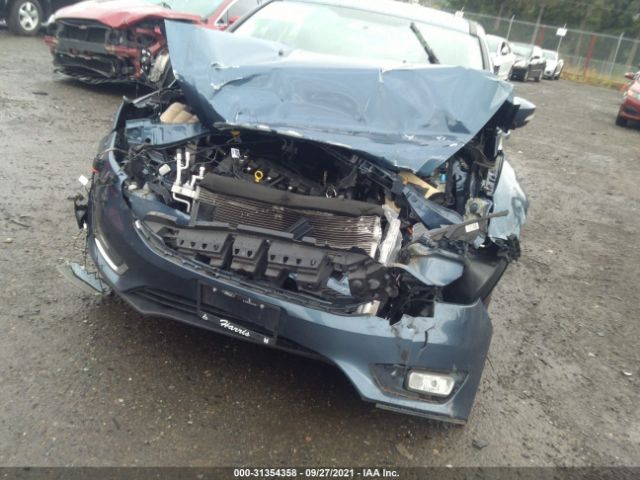 Photo 5 VIN: 1FADP3N24JL313776 - FORD FOCUS 