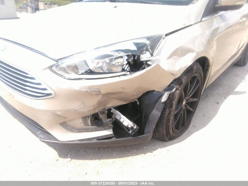 Photo 5 VIN: 1FADP3N24JL313986 - FORD FOCUS 