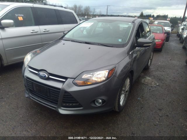 Photo 1 VIN: 1FADP3N25EL303540 - FORD FOCUS 