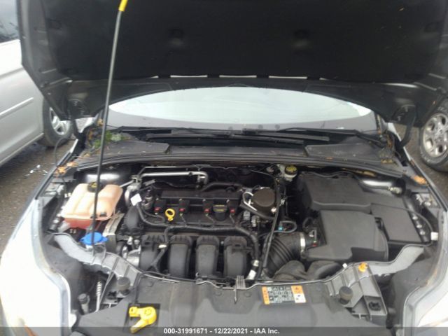 Photo 9 VIN: 1FADP3N25EL303540 - FORD FOCUS 