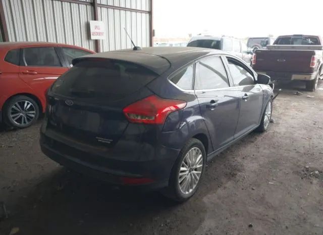 Photo 3 VIN: 1FADP3N25GL207698 - FORD FOCUS 