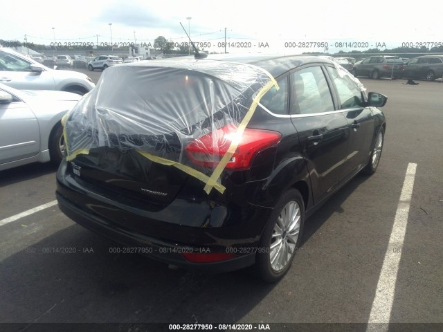 Photo 3 VIN: 1FADP3N25GL330062 - FORD FOCUS 