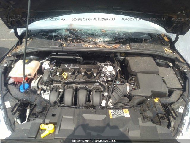 Photo 9 VIN: 1FADP3N25GL330062 - FORD FOCUS 