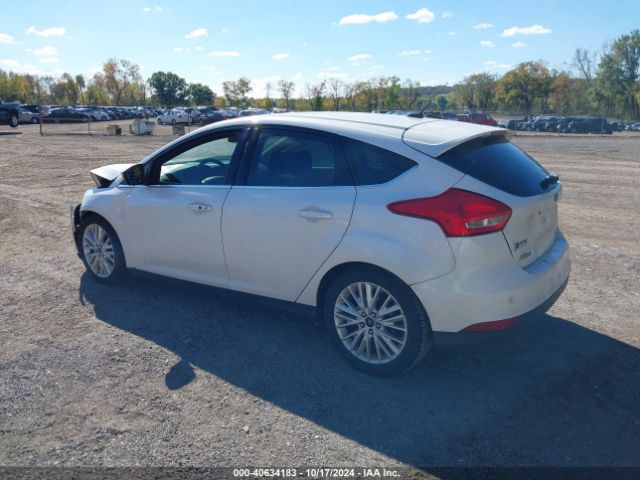 Photo 2 VIN: 1FADP3N25GL332670 - FORD FOCUS 