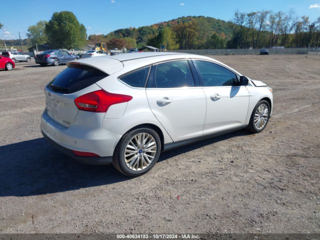 Photo 3 VIN: 1FADP3N25GL332670 - FORD FOCUS 