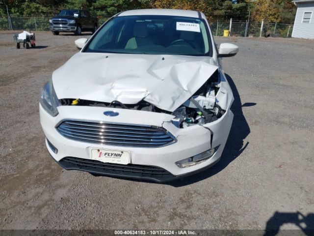 Photo 5 VIN: 1FADP3N25GL332670 - FORD FOCUS 