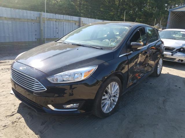 Photo 1 VIN: 1FADP3N25JL261784 - FORD FOCUS TITA 