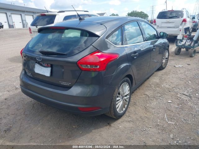 Photo 3 VIN: 1FADP3N26GL299338 - FORD FOCUS 