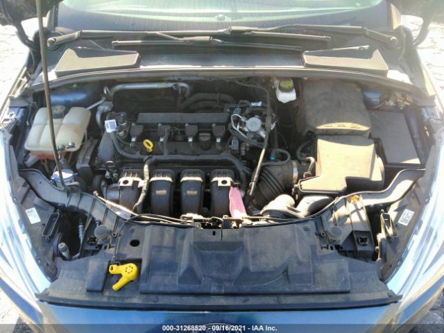 Photo 9 VIN: 1FADP3N26JL223951 - FORD FOCUS 