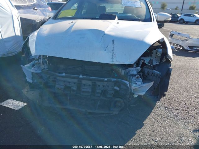 Photo 5 VIN: 1FADP3N27GL254036 - FORD FOCUS 