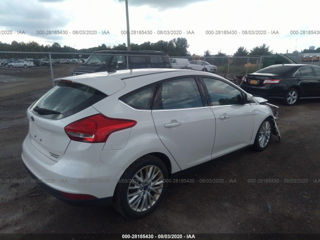 Photo 3 VIN: 1FADP3N27GL320939 - FORD FOCUS 