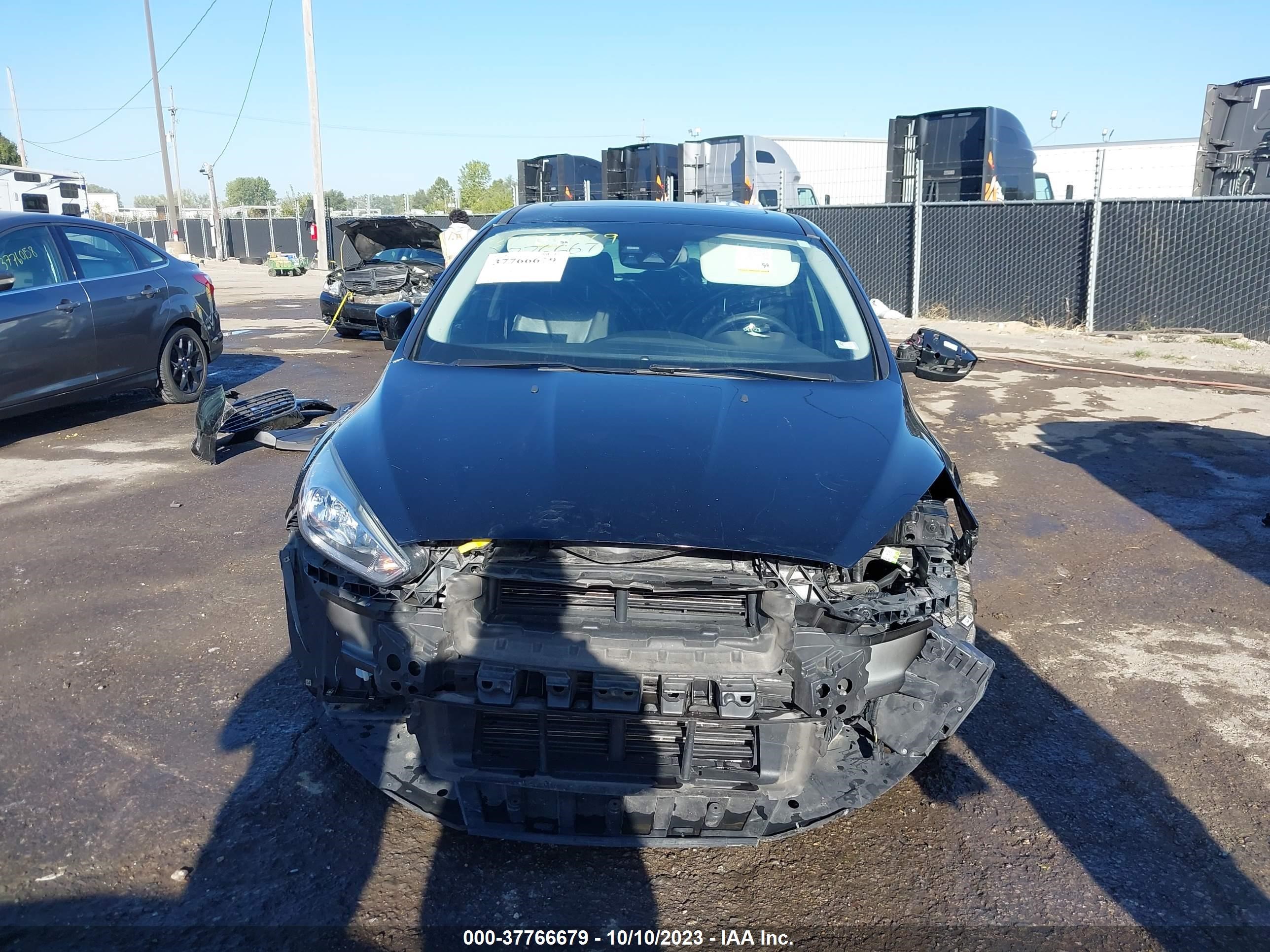 Photo 12 VIN: 1FADP3N27HL214413 - FORD FOCUS 