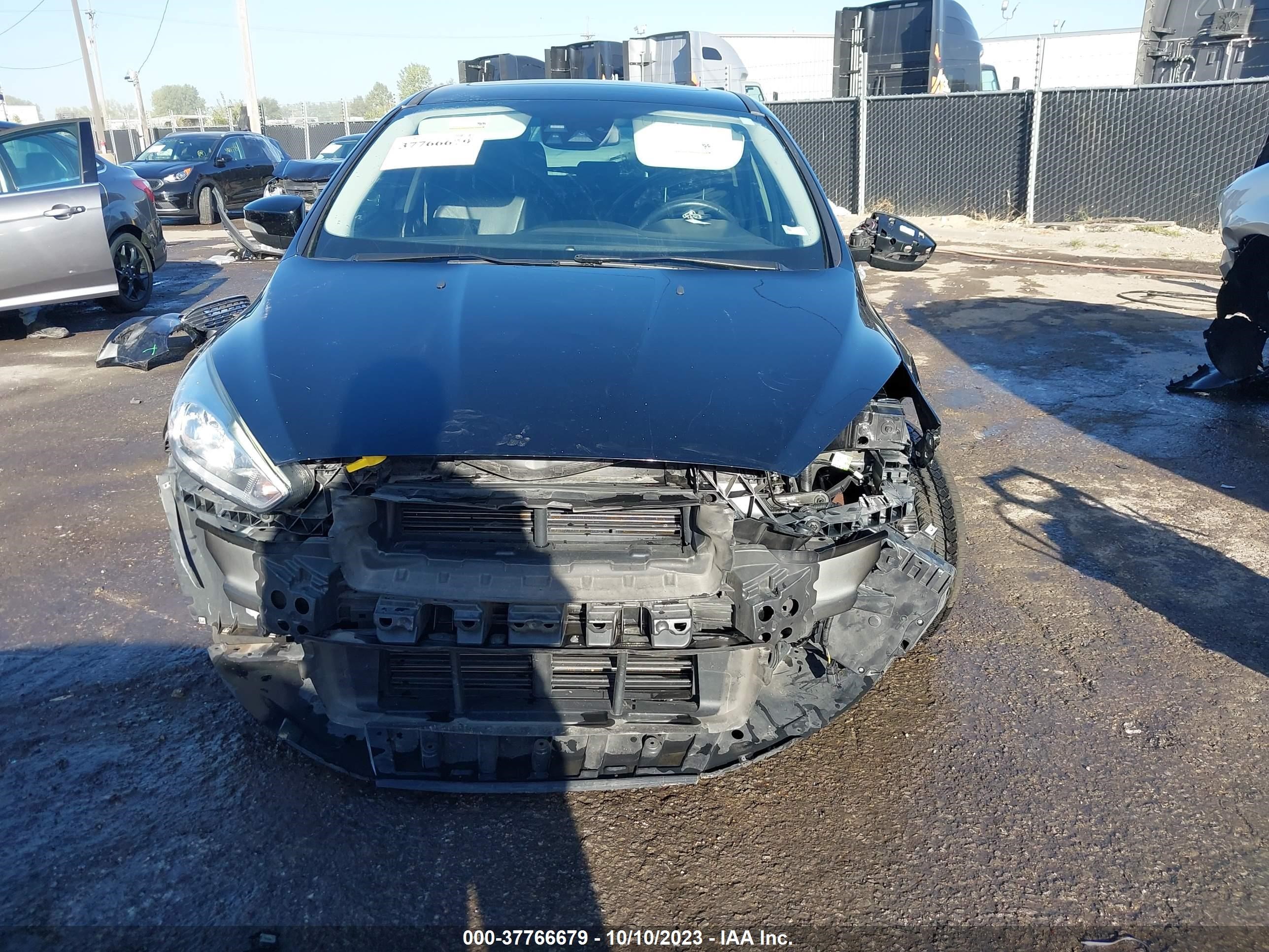 Photo 5 VIN: 1FADP3N27HL214413 - FORD FOCUS 