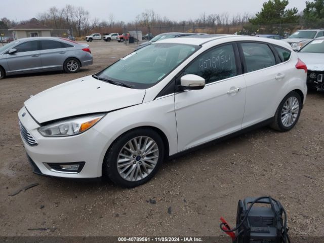 Photo 1 VIN: 1FADP3N28GL242879 - FORD FOCUS 