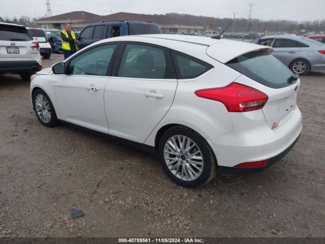 Photo 2 VIN: 1FADP3N28GL242879 - FORD FOCUS 