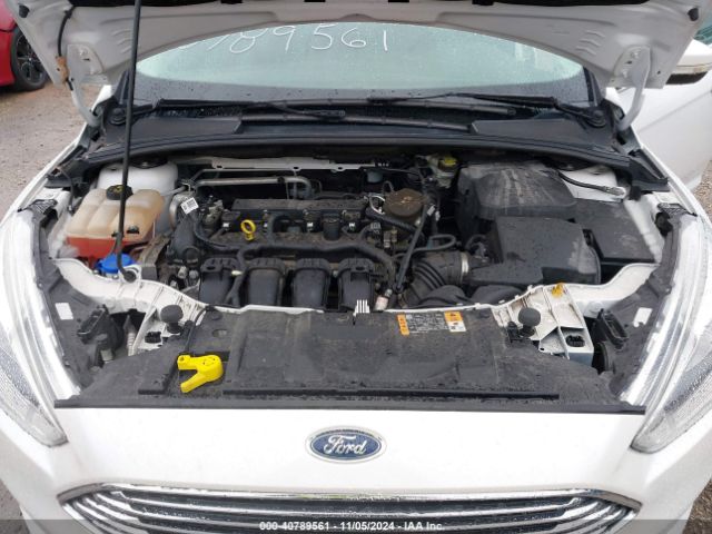 Photo 9 VIN: 1FADP3N28GL242879 - FORD FOCUS 