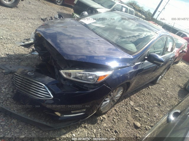 Photo 1 VIN: 1FADP3N28GL321551 - FORD FOCUS 